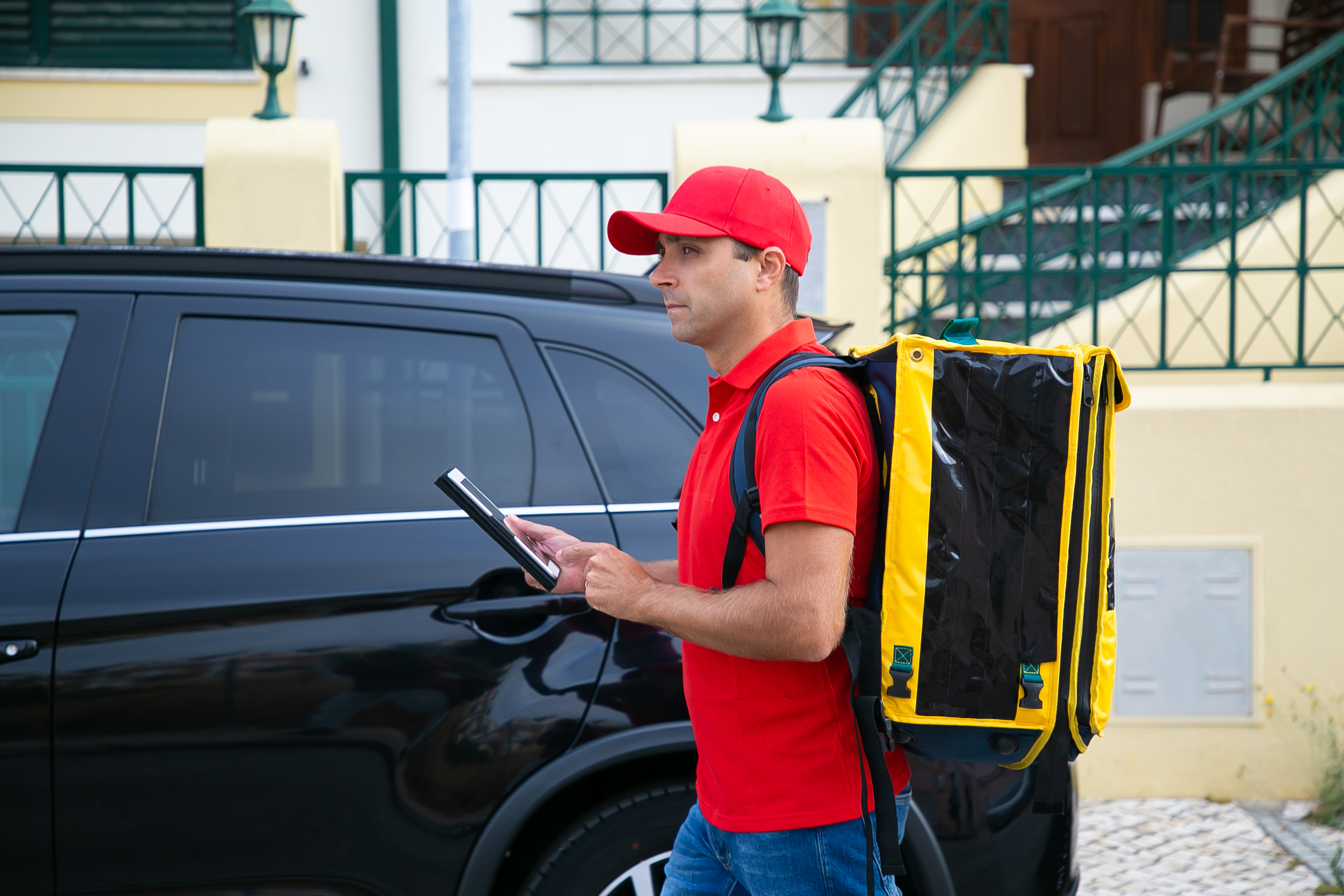 Delivery driver in vehicle